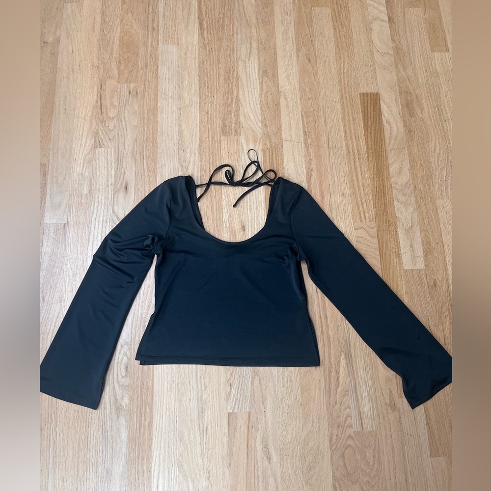 Black bell sleeve top
